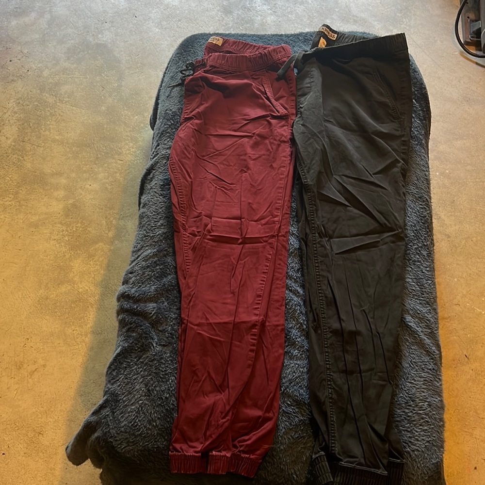 2 pairs of men’s Express joggers size 36. One red pair one black pair